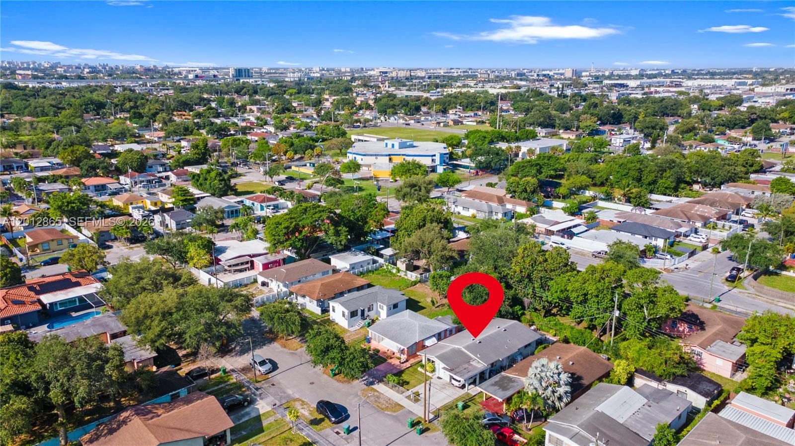 5300 Northwest 30th Place Miami, FL 33142 - Photo 32 of 35 an aerial view of residential houses with outdoor space and street view