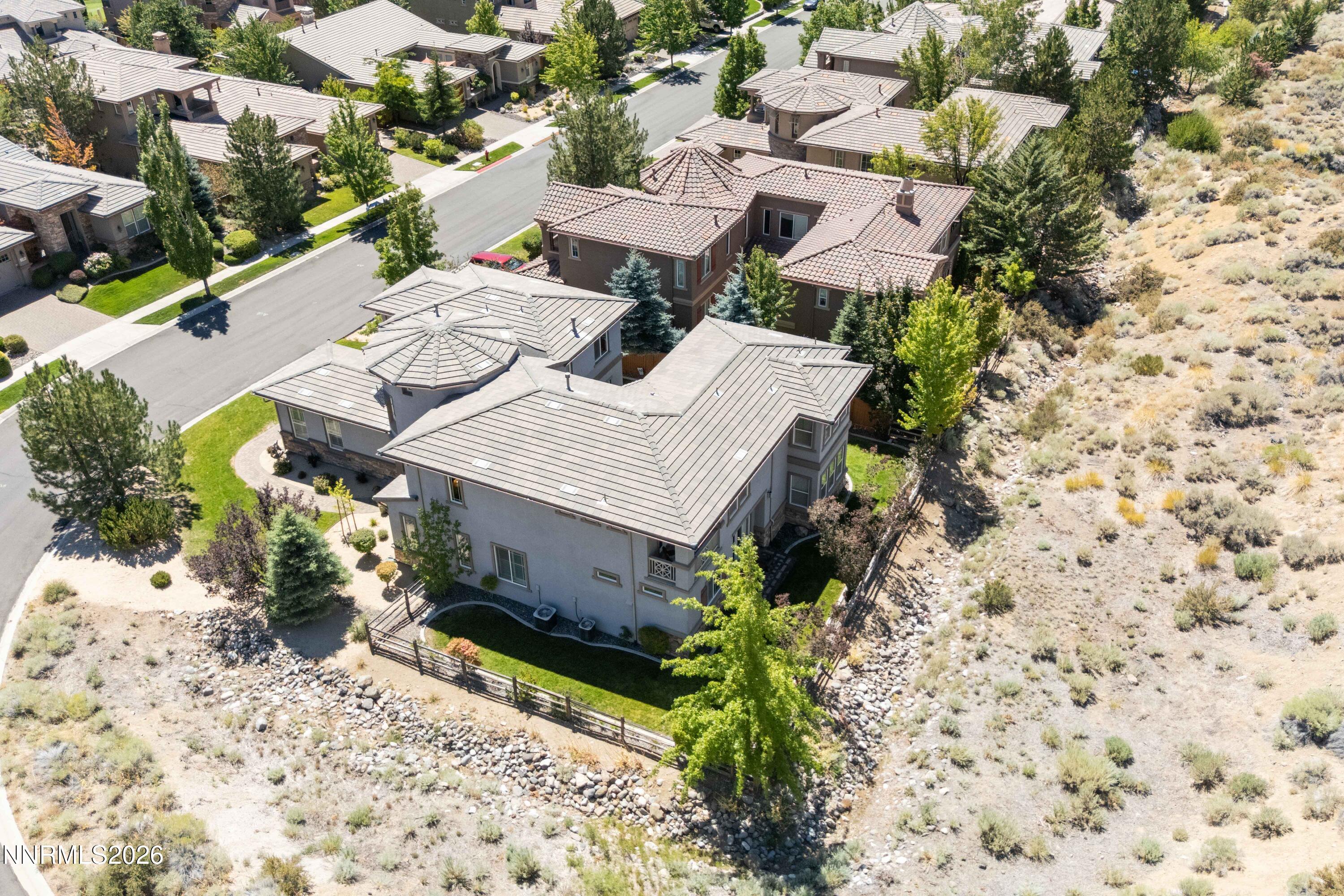 2395 Ridge Field Trail Reno, NV 89523 - Photo 39 of 44 an aerial view of a house with a yard and trees