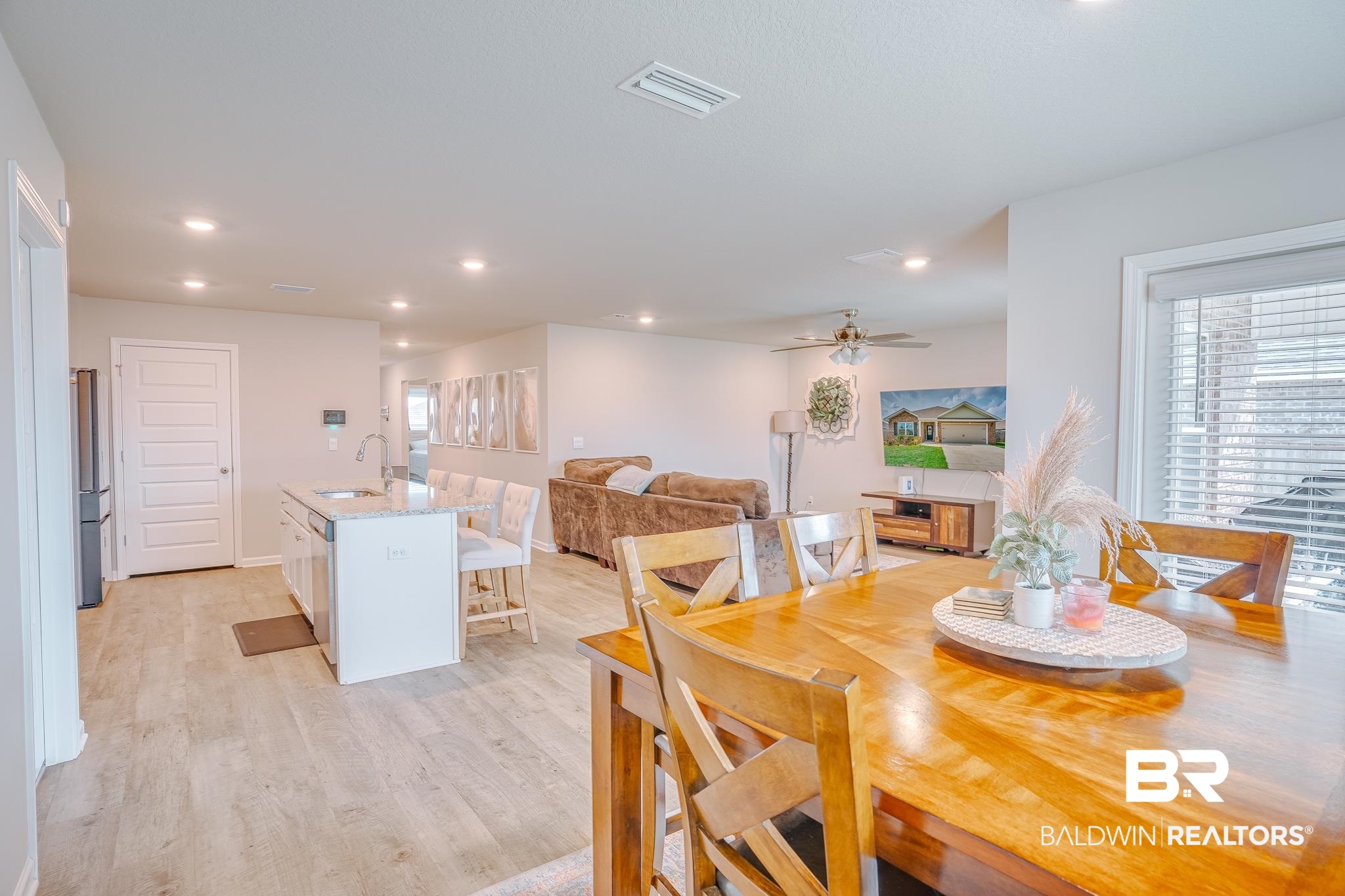 8242 Sycamore Way Semmes, AL 36575 - Photo 16 of 43 Dining area with light wood-style flooring, ceiling fan, and recessed lighting