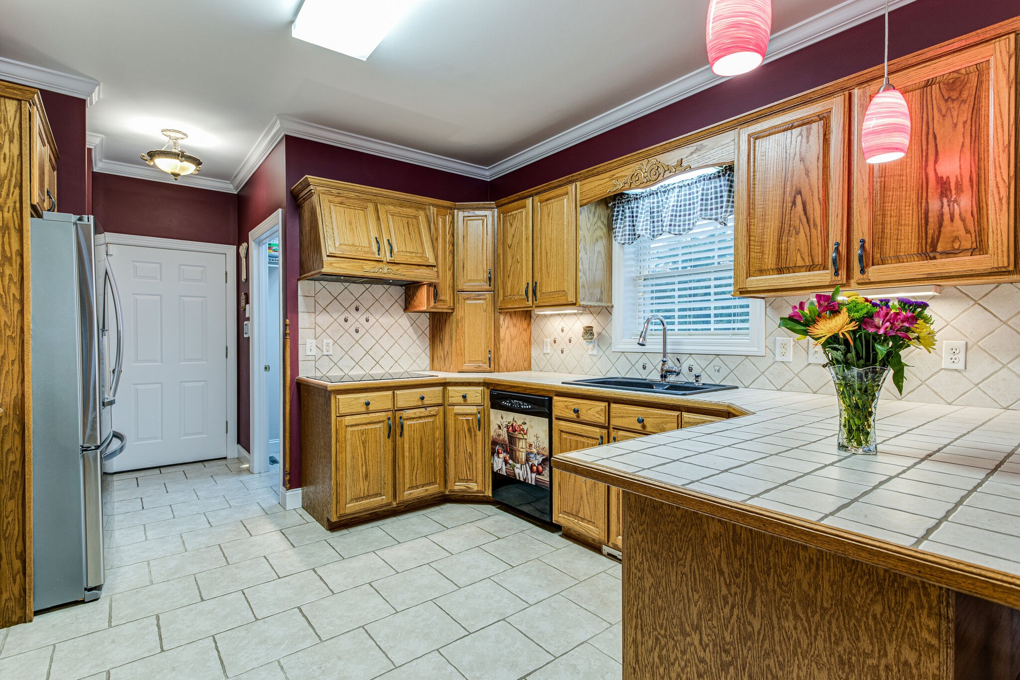 481 Matts Hollow Road Manchester, TN 37355 - Photo 16 of 42 a kitchen with stainless steel appliances granite countertop a stove a sink and a refrigerator
