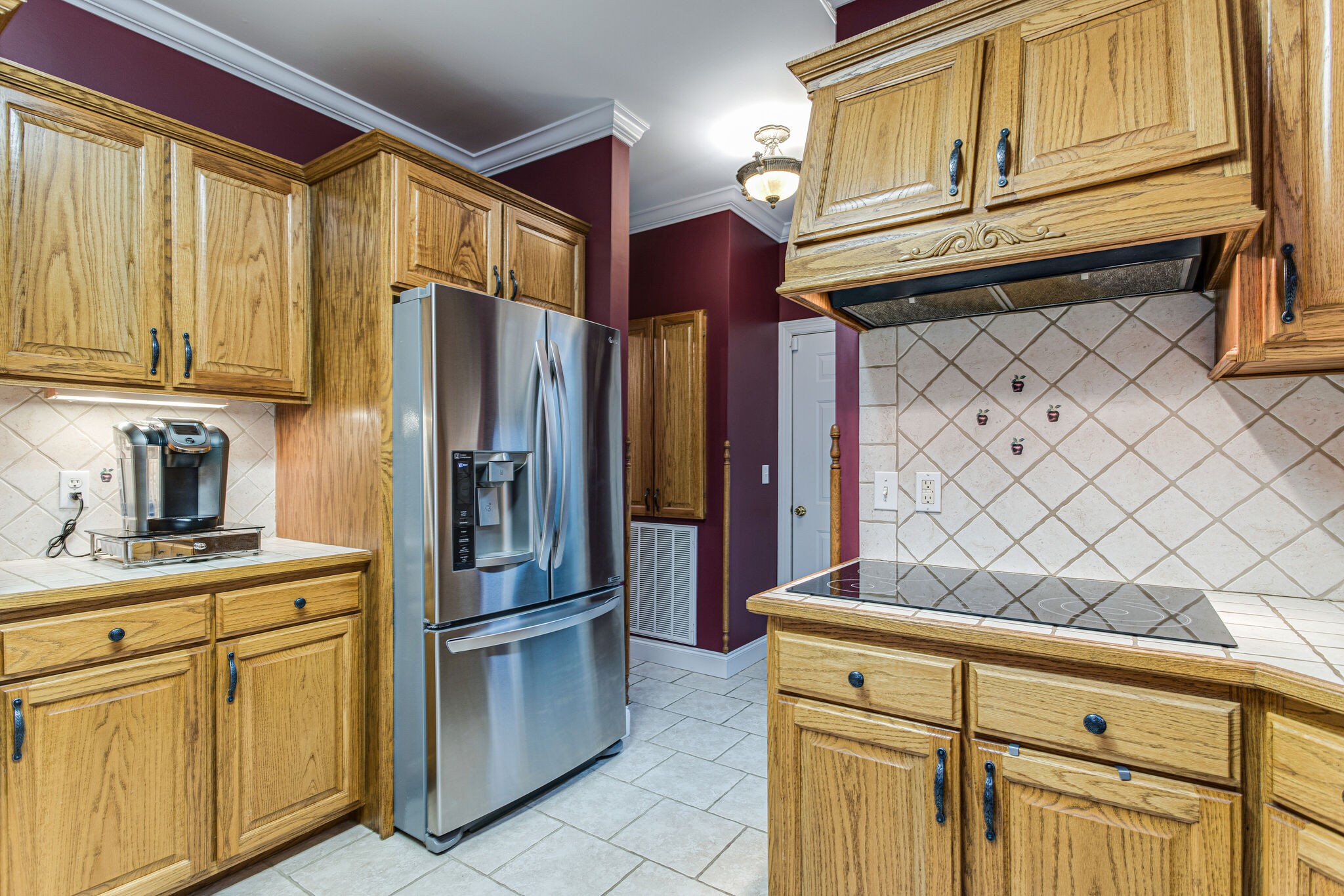 481 Matts Hollow Road Manchester, TN 37355 - Photo 17 of 42 a kitchen with stainless steel appliances granite countertop a refrigerator and cabinets