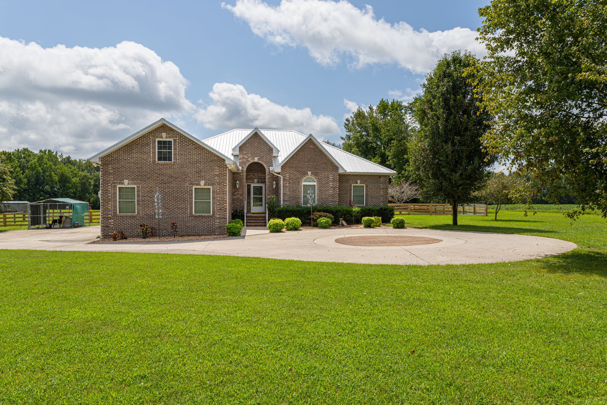 481 Matts Hollow Road Manchester, TN 37355 - Photo 3 of 42 a front view of a house with a yard
