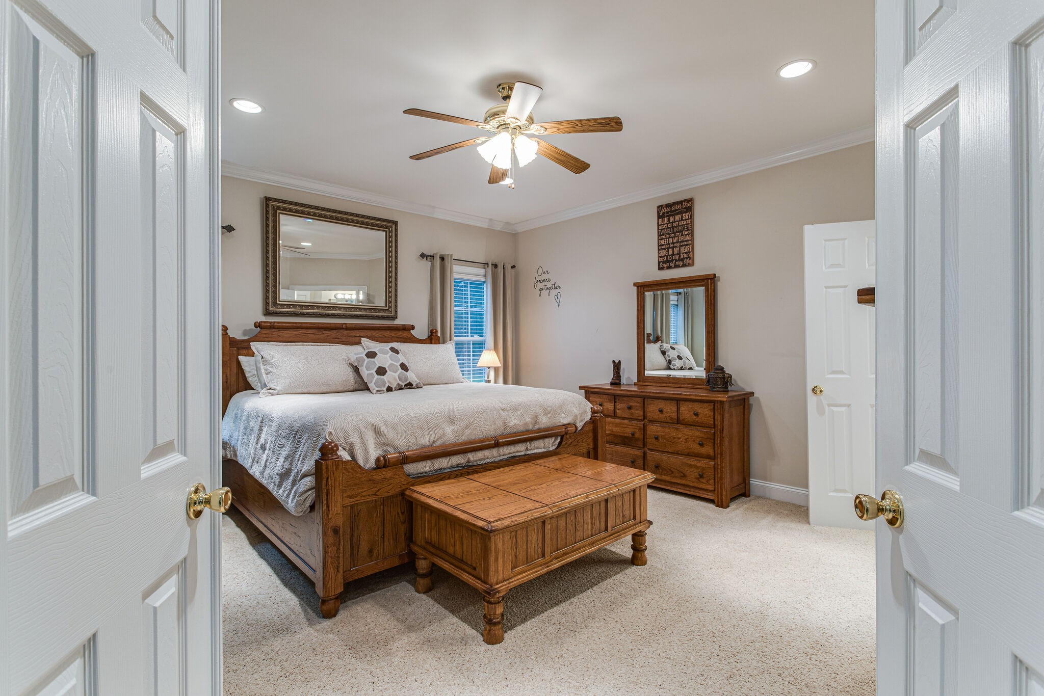481 Matts Hollow Road Manchester, TN 37355 - Photo 21 of 42 a bedroom with a bed and dresser
