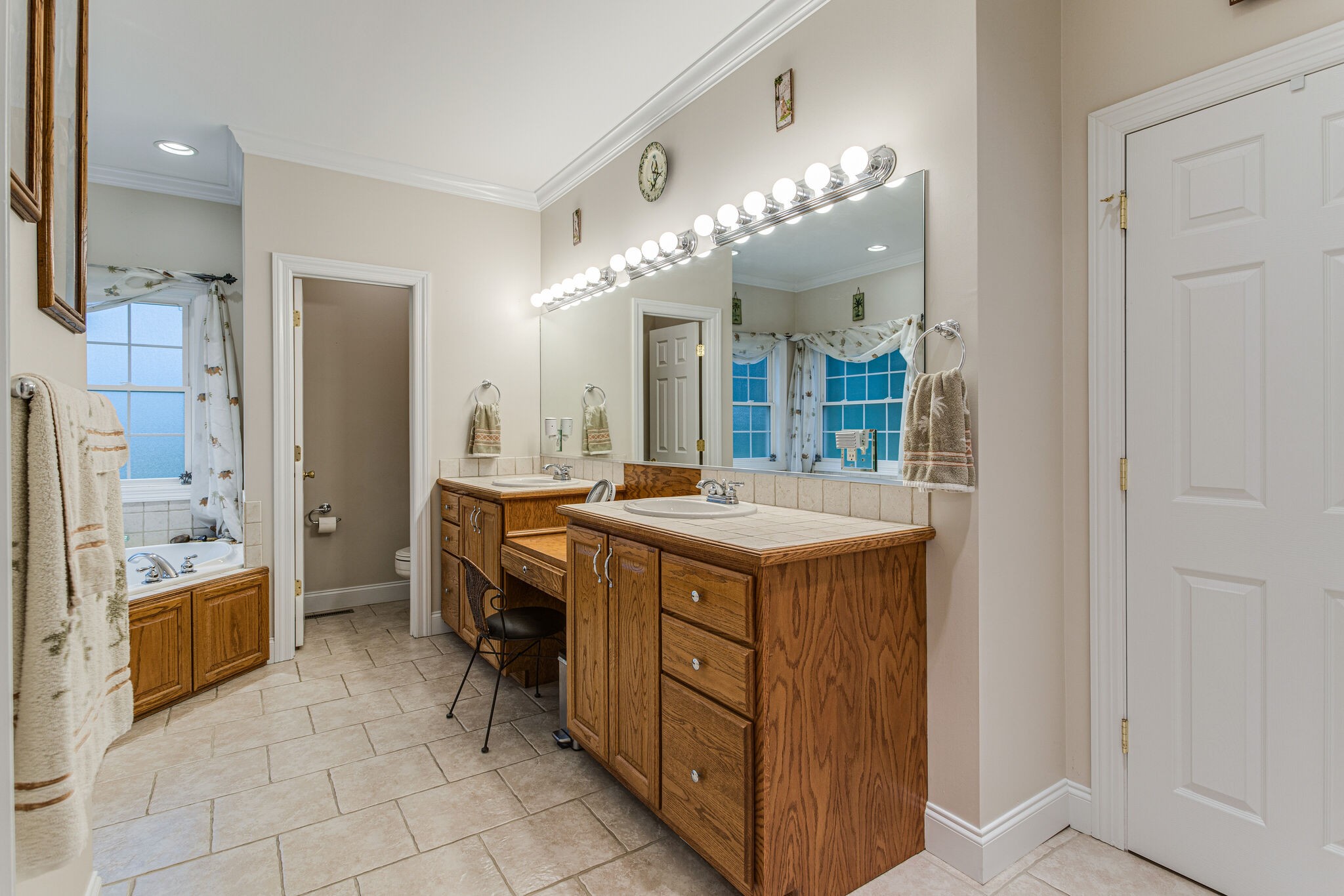 481 Matts Hollow Road Manchester, TN 37355 - Photo 23 of 42 a bathroom with a granite countertop sink a large mirror and a shower