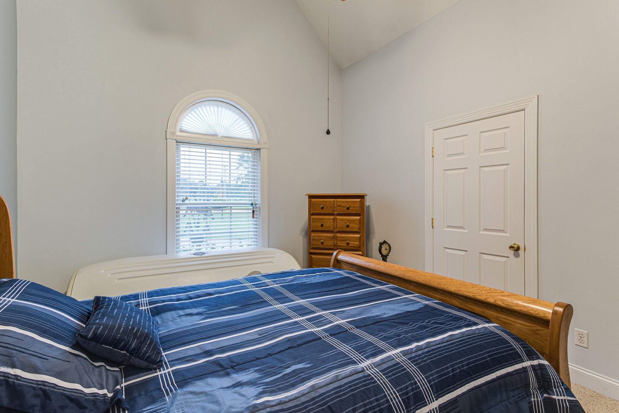 481 Matts Hollow Road Manchester, TN 37355 - Photo 27 of 42 a bedroom with a bed and wooden floor