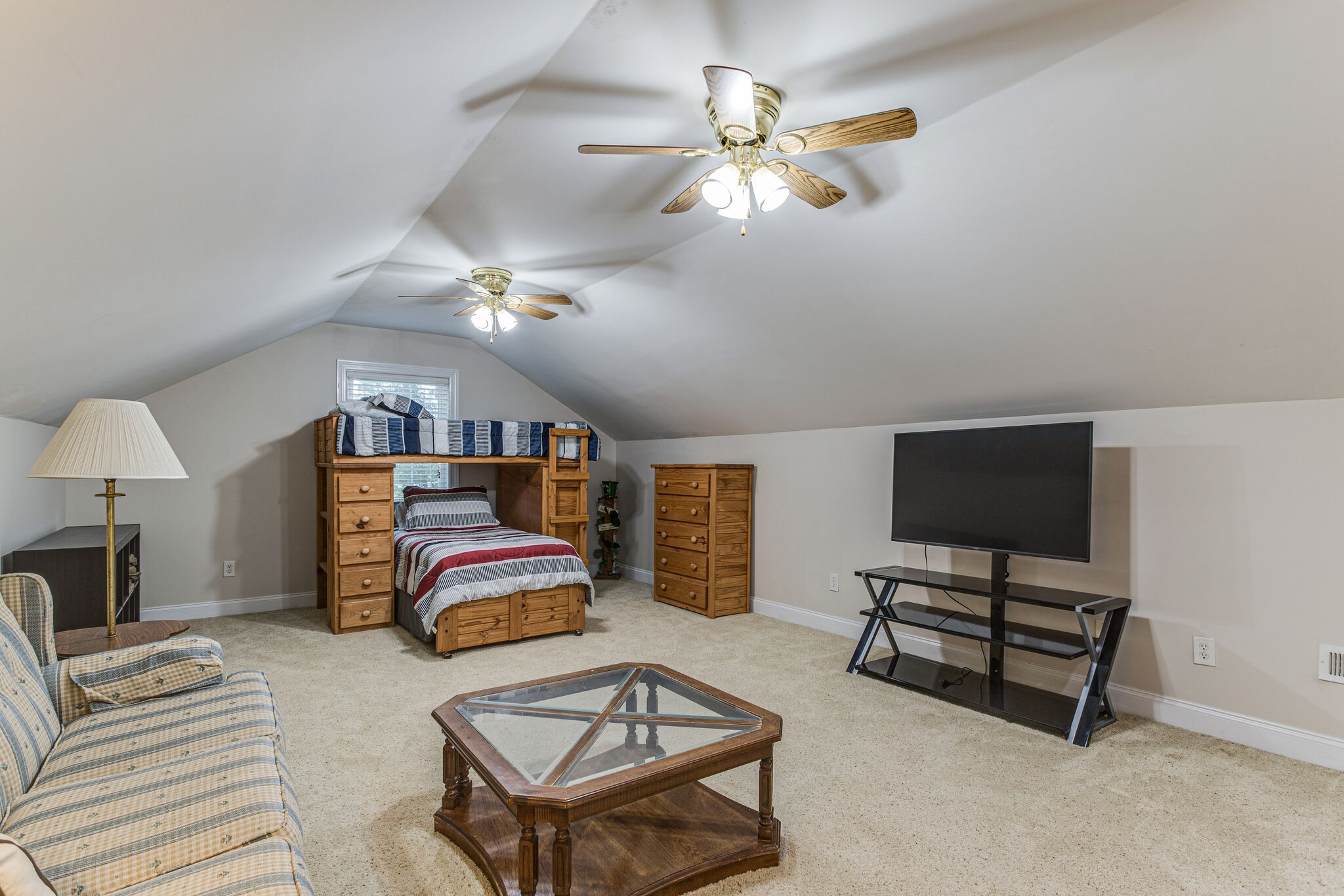 481 Matts Hollow Road Manchester, TN 37355 - Photo 33 of 42 a bedroom with furniture and a flat screen tv
