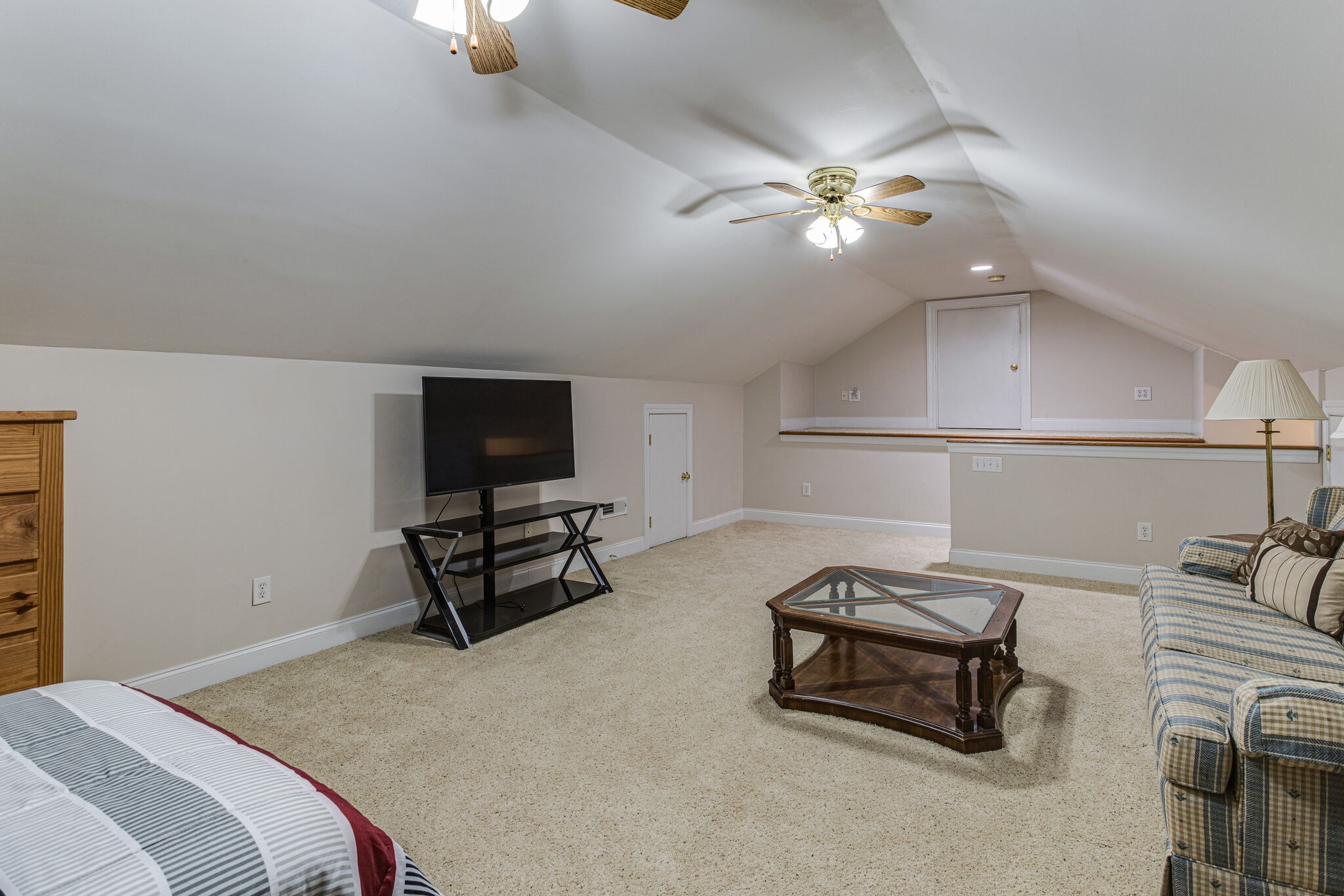 481 Matts Hollow Road Manchester, TN 37355 - Photo 34 of 42 a bedroom with furniture and a chandelier