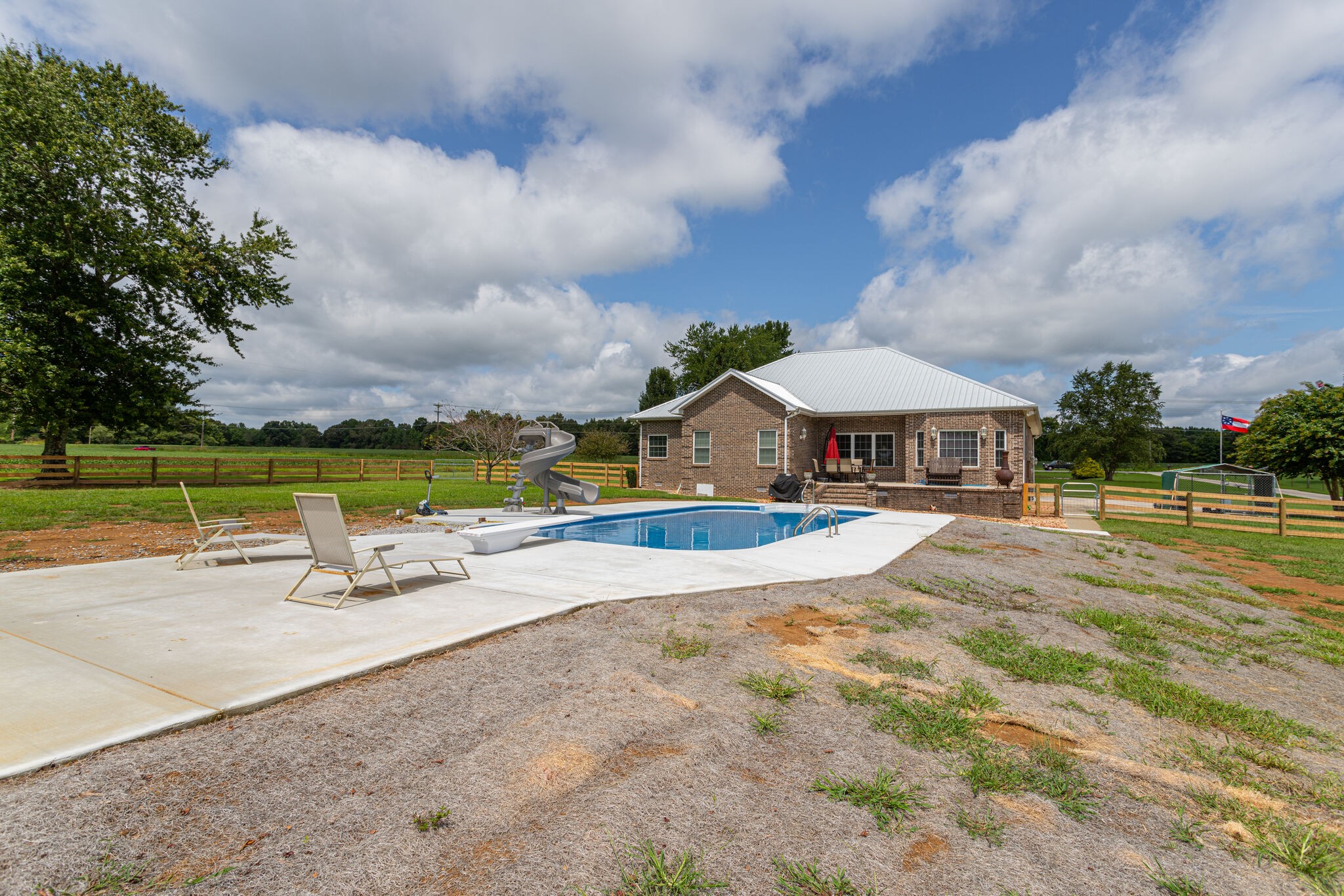 481 Matts Hollow Road Manchester, TN 37355 - Photo 37 of 42 a view of swimming pool with outdoor seating and yard in back