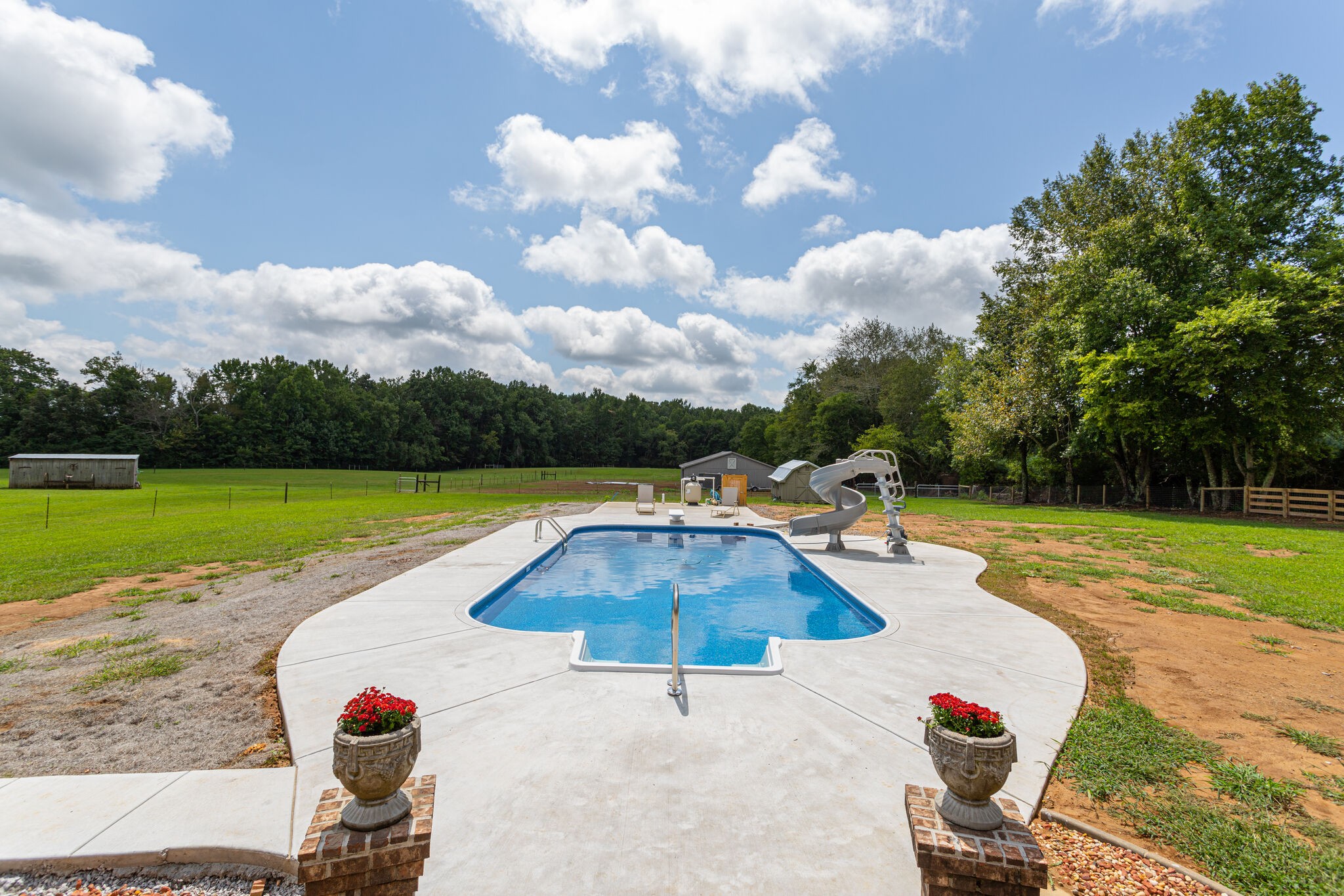 481 Matts Hollow Road Manchester, TN 37355 - Photo 38 of 42 a view of a backyard with swimming pool