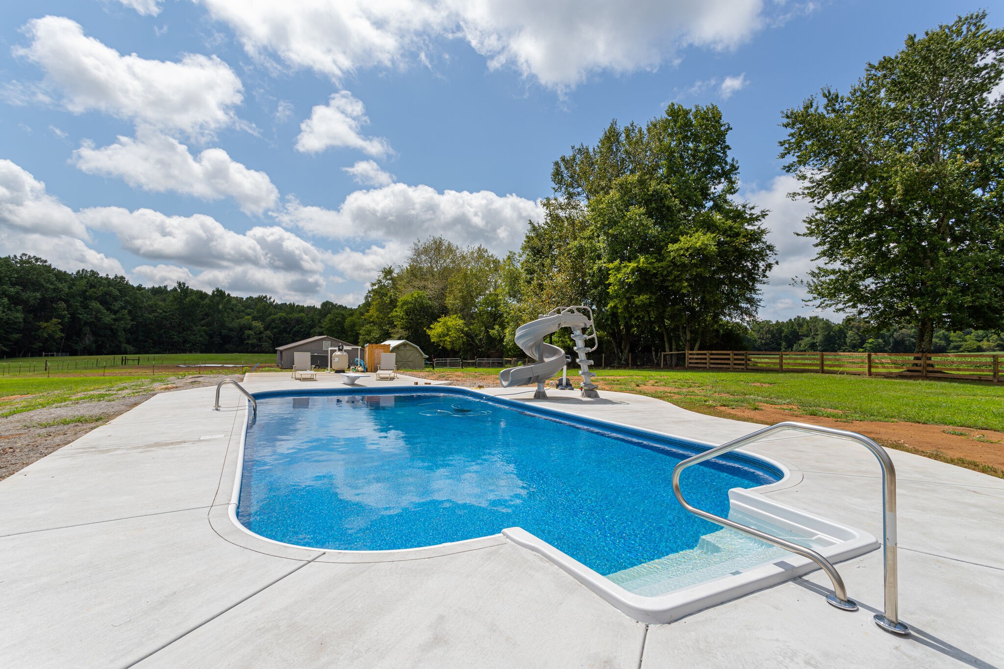 481 Matts Hollow Road Manchester, TN 37355 - Photo 39 of 42 a view of a swimming pool with a yard