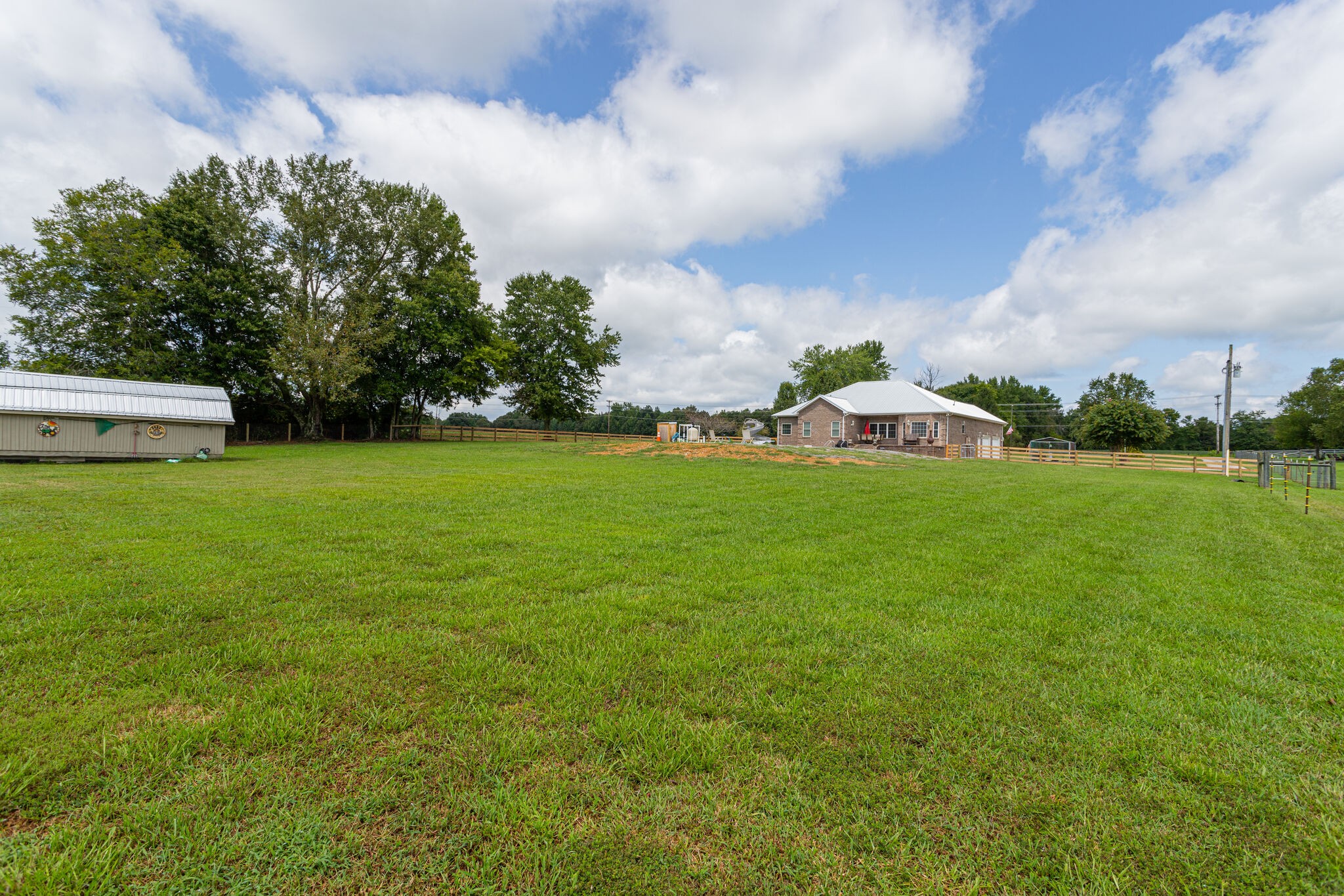 481 Matts Hollow Road Manchester, TN 37355 - Photo 40 of 42 a view of a house with a backyard