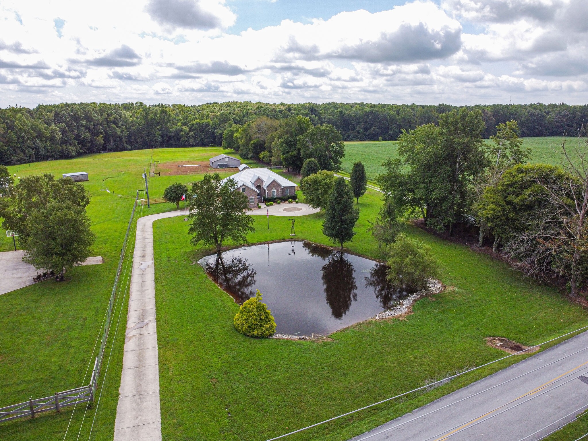 481 Matts Hollow Road Manchester, TN 37355 - Photo 5 of 42 a view of a garden with an outdoor space