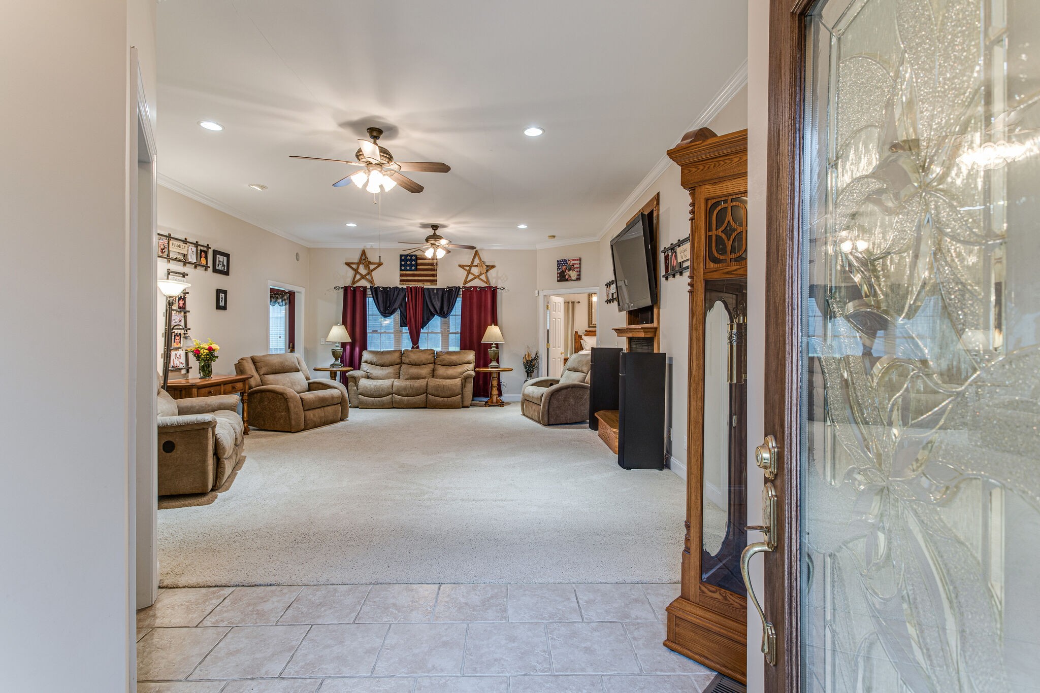 481 Matts Hollow Road Manchester, TN 37355 - Photo 7 of 42 a view of a livingroom with furniture and a ceiling fan