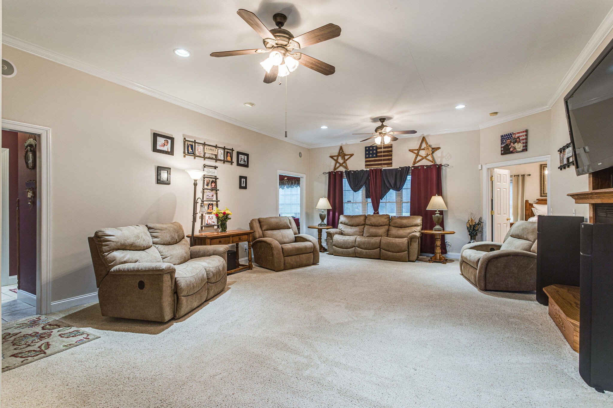 481 Matts Hollow Road Manchester, TN 37355 - Photo 8 of 42 a living room with furniture kitchen view and a chandelier