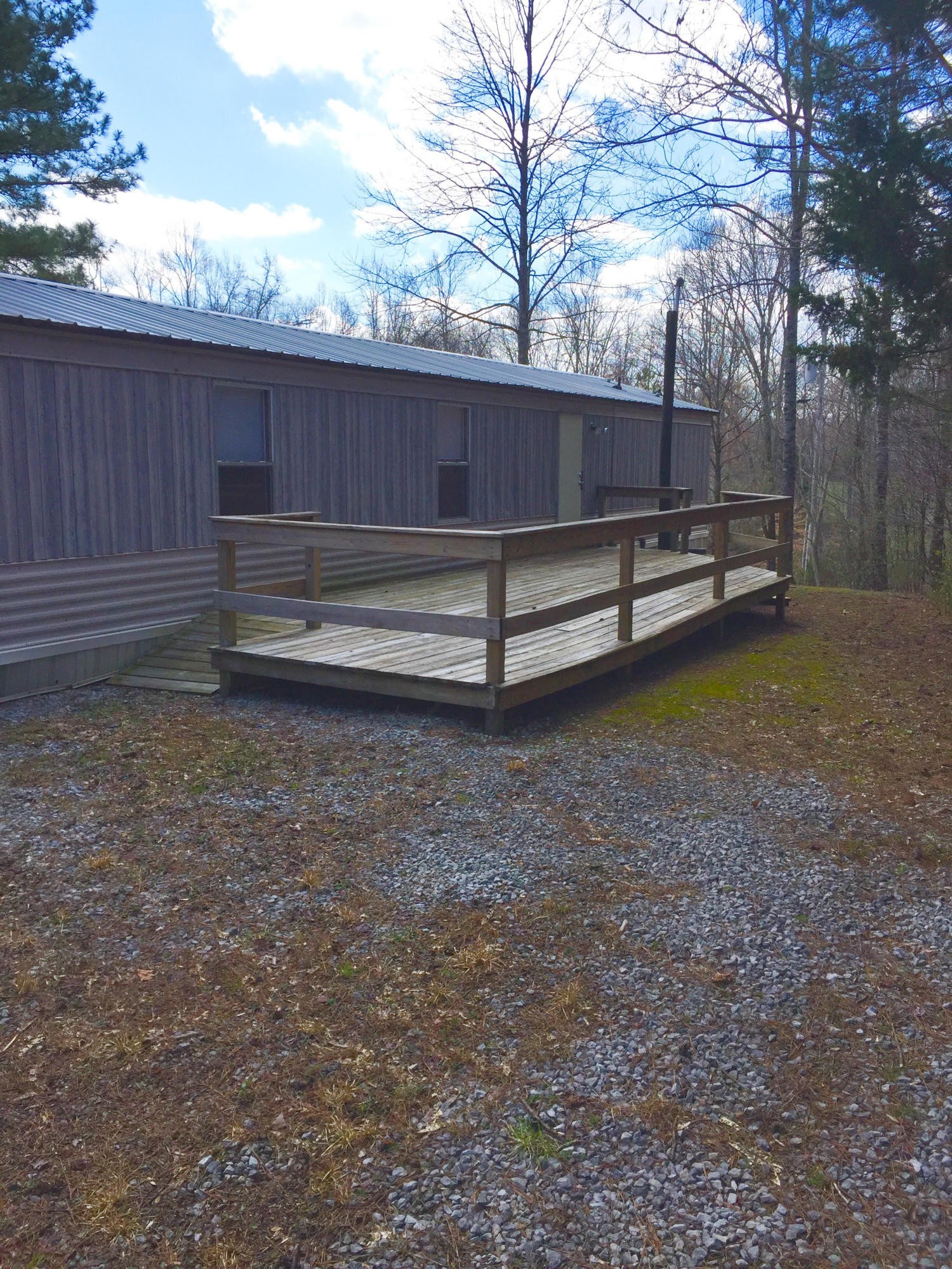 155 Four Star Point Road Smithville, TN 37166 - Photo 3 of 15 a view of a yard with wooden fence