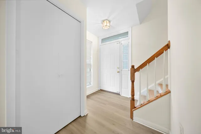 a view of entryway with wooden floor