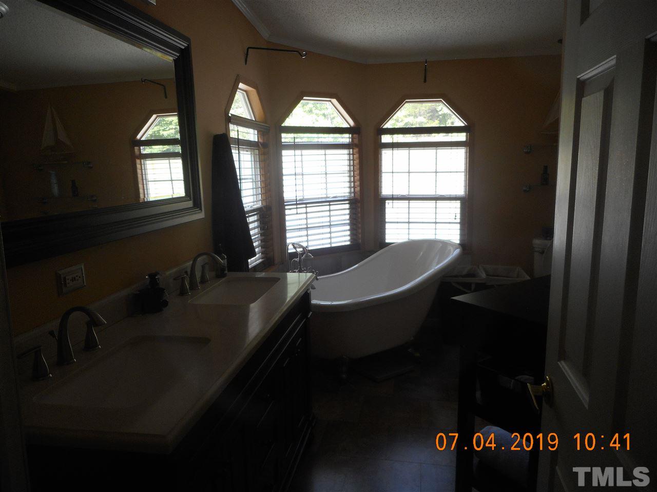 301 Mountain Ridge Road Rougemont, NC 27572 - Photo 12 of 22 a living room with furniture and a window