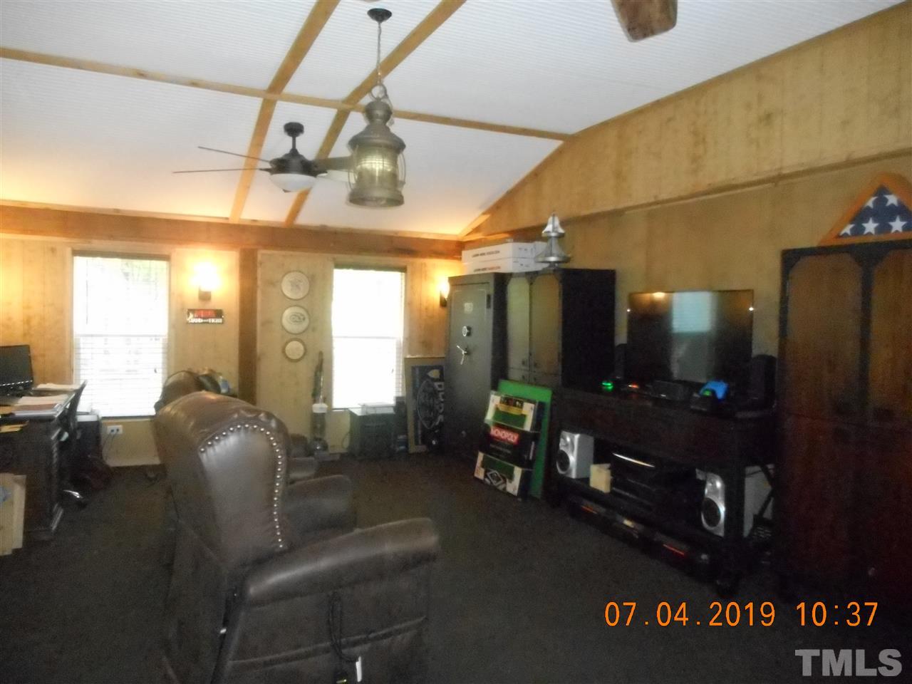 301 Mountain Ridge Road Rougemont, NC 27572 - Photo 18 of 22 a living room with furniture