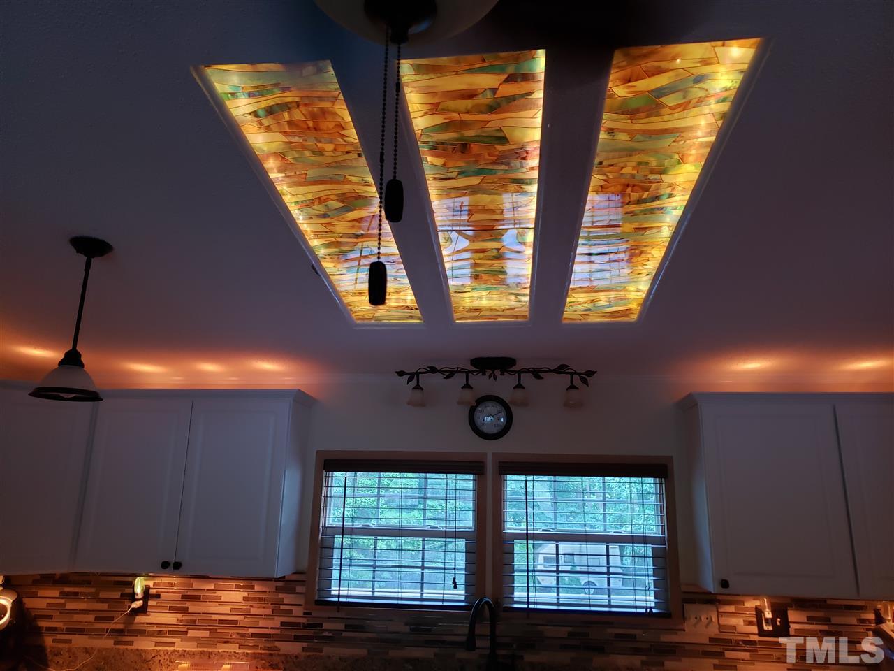301 Mountain Ridge Road Rougemont, NC 27572 - Photo 20 of 22 a room with window and chandelier