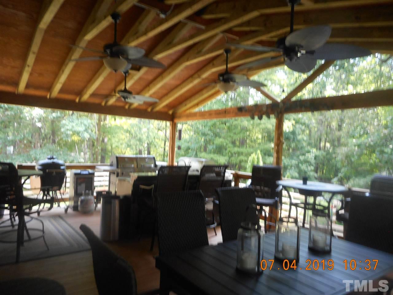 301 Mountain Ridge Road Rougemont, NC 27572 - Photo 6 of 22 a view of living room with furniture and wooden floor