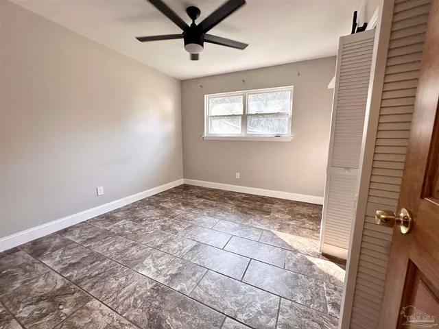 a view of a big room with wooden floor