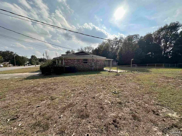 a view of street with yard