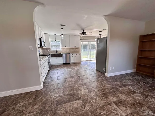 a view of kitchen and sink