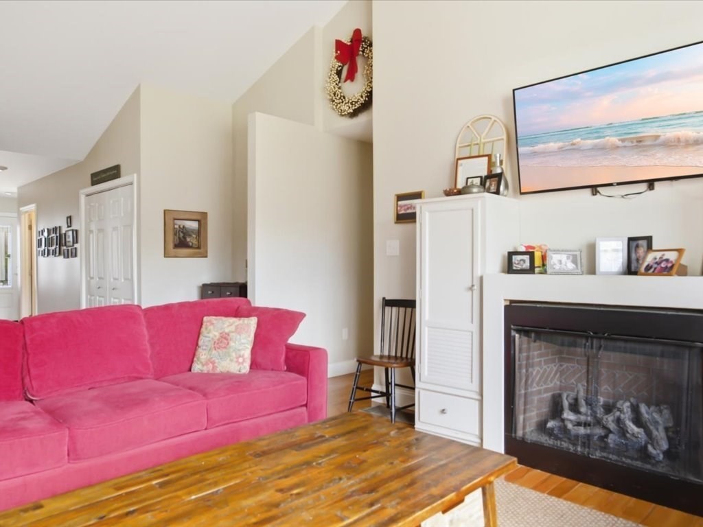 67 Ling Street Fall River, MA 02720 - Photo 7 of 32 a living room with furniture and a fireplace