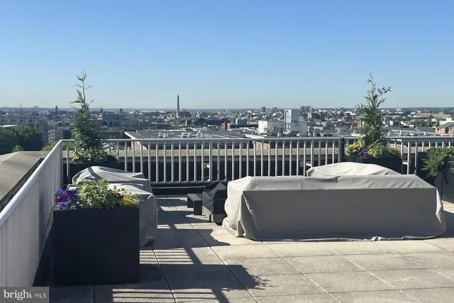 a stove top oven sitting inside of a kitchen