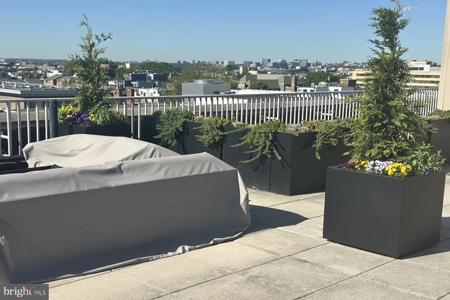 a front view of a building with street view