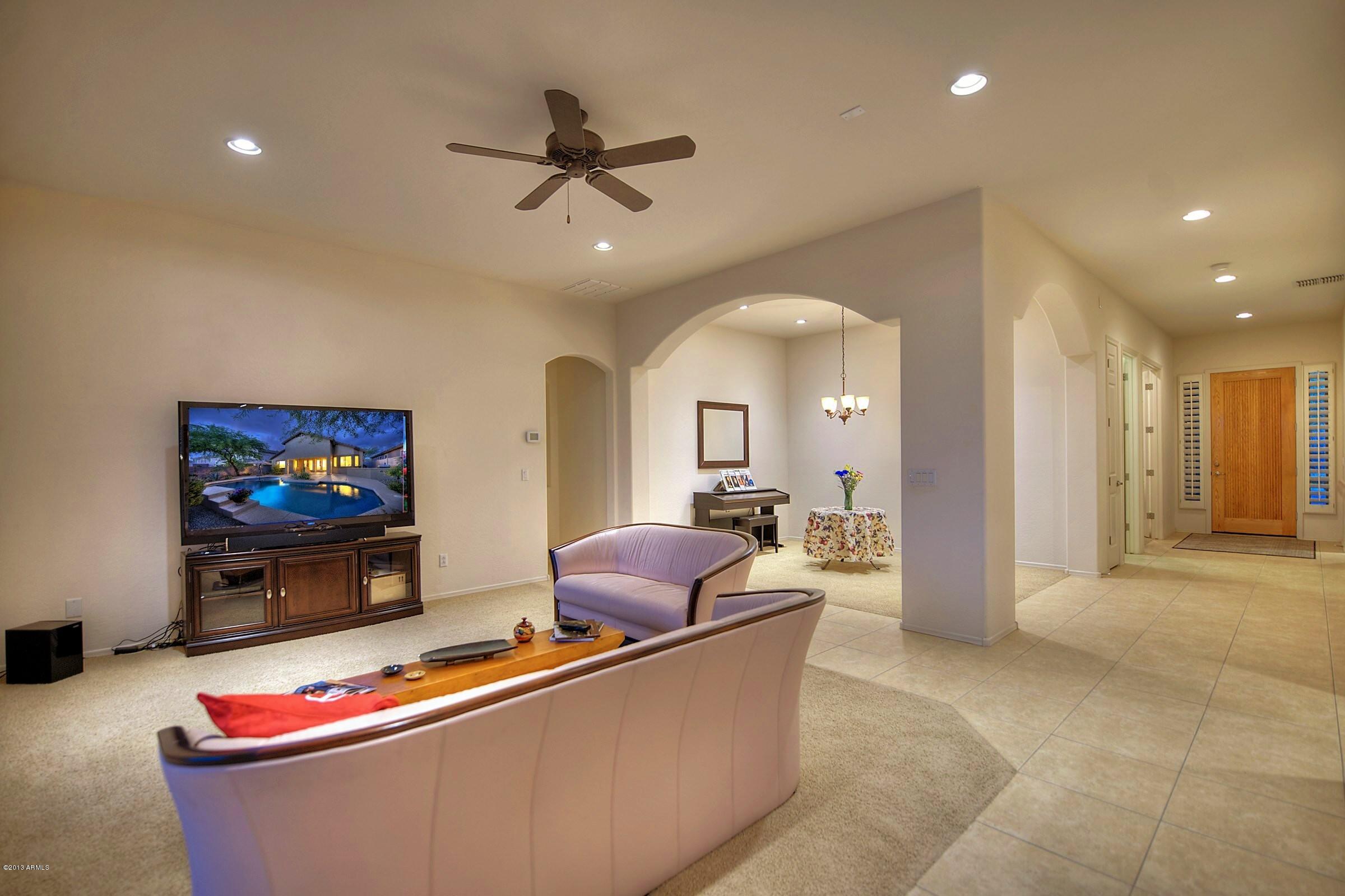 2323 West Apache Rain Road Phoenix, AZ 85085 - Photo 12 of 29 009_Living -Dining Room View