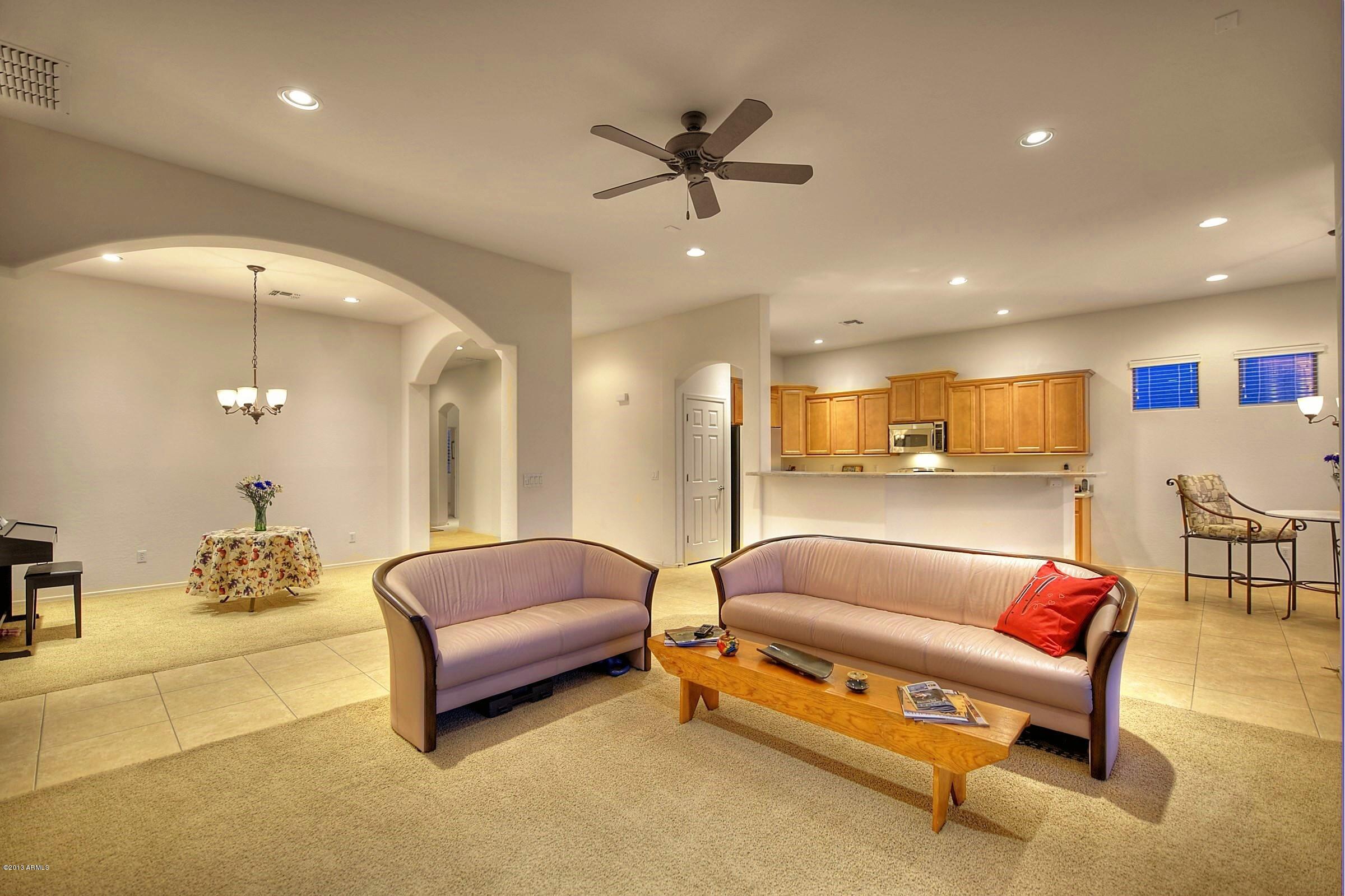 2323 West Apache Rain Road Phoenix, AZ 85085 - Photo 10 of 29 008_Living Room-Kitchen View