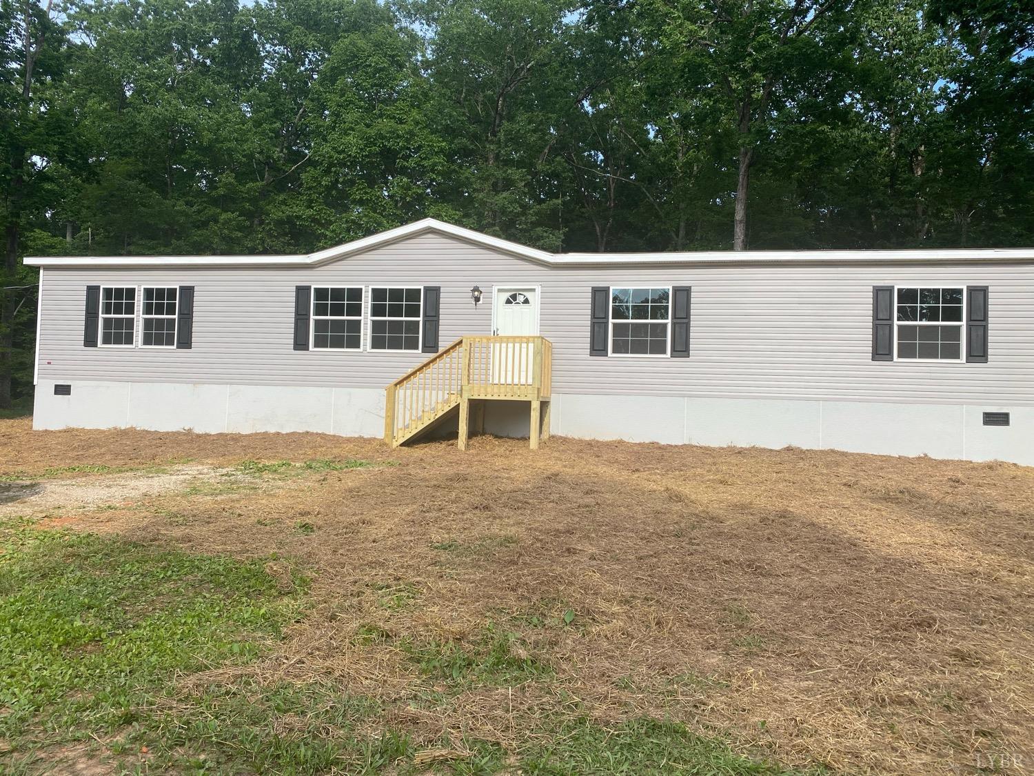 4006 Red House Road Appomattox, VA 24522 - Photo 1 of 11 a front view of a house with a yard