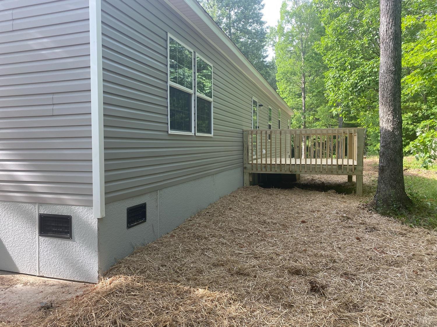 4006 Red House Road Appomattox, VA 24522 - Photo 8 of 11 a view of a house with a yard