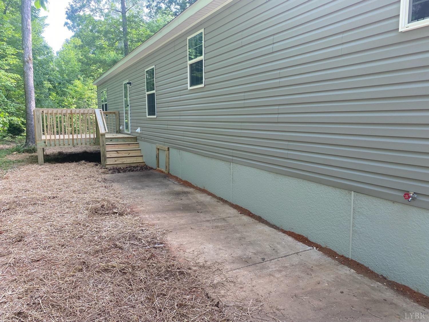 4006 Red House Road Appomattox, VA 24522 - Photo 10 of 11 a view of a house with a backyard