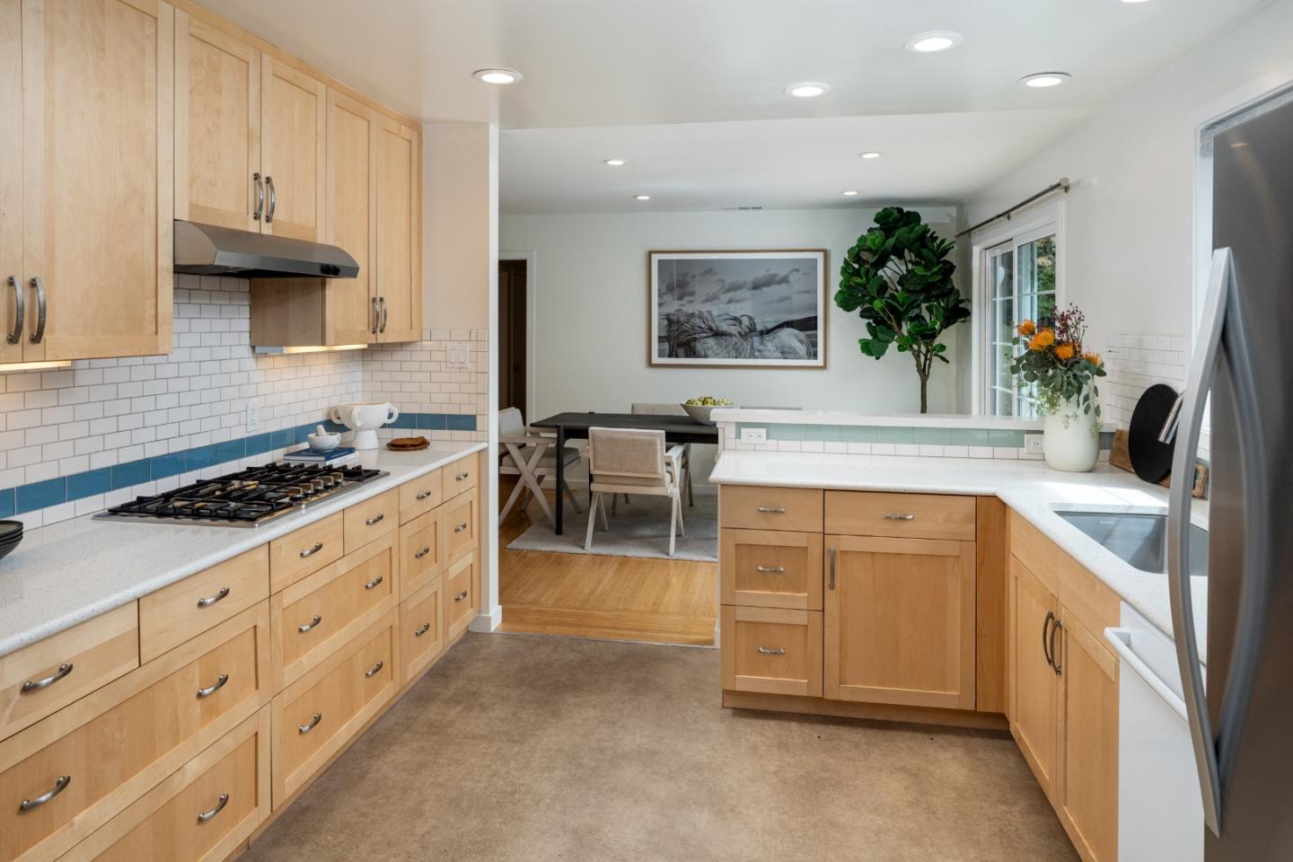 317 Bay Road Menlo Park, CA 94025 - Photo 11 of 26 a kitchen with stainless steel appliances granite countertop a stove and a sink