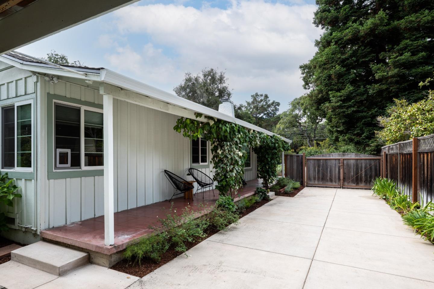 317 Bay Road Menlo Park, CA 94025 - Photo 2 of 26 a view of house with backyard and sitting area