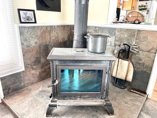 1 B Kittredge Road Shirley, MA 01464 - Photo 4 of 16 a fireplace with a sink
