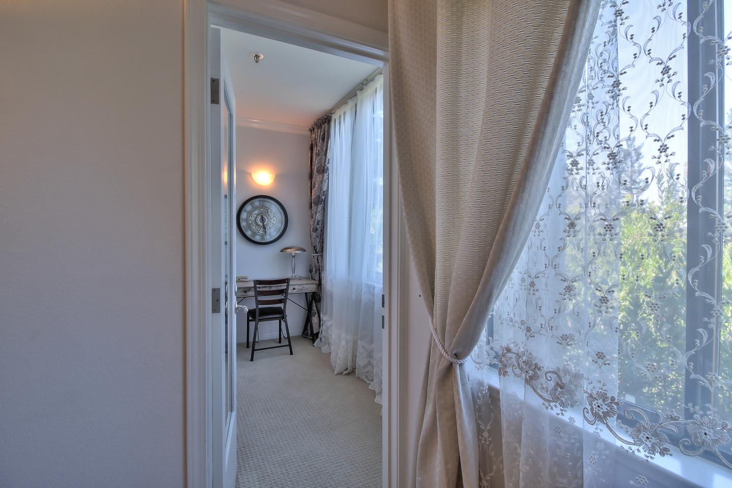 2200 Agnew Road, Unit 210 Santa Clara, CA 95054 - Photo 13 of 30 a view of a hallway and entryway