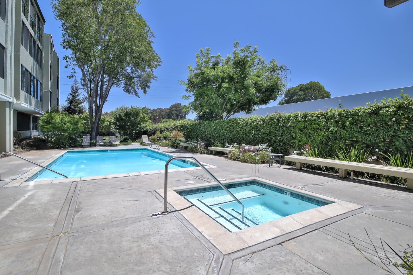 2200 Agnew Road, Unit 210 Santa Clara, CA 95054 - Photo 15 of 30 a view of a swimming pool with a lounge chairs