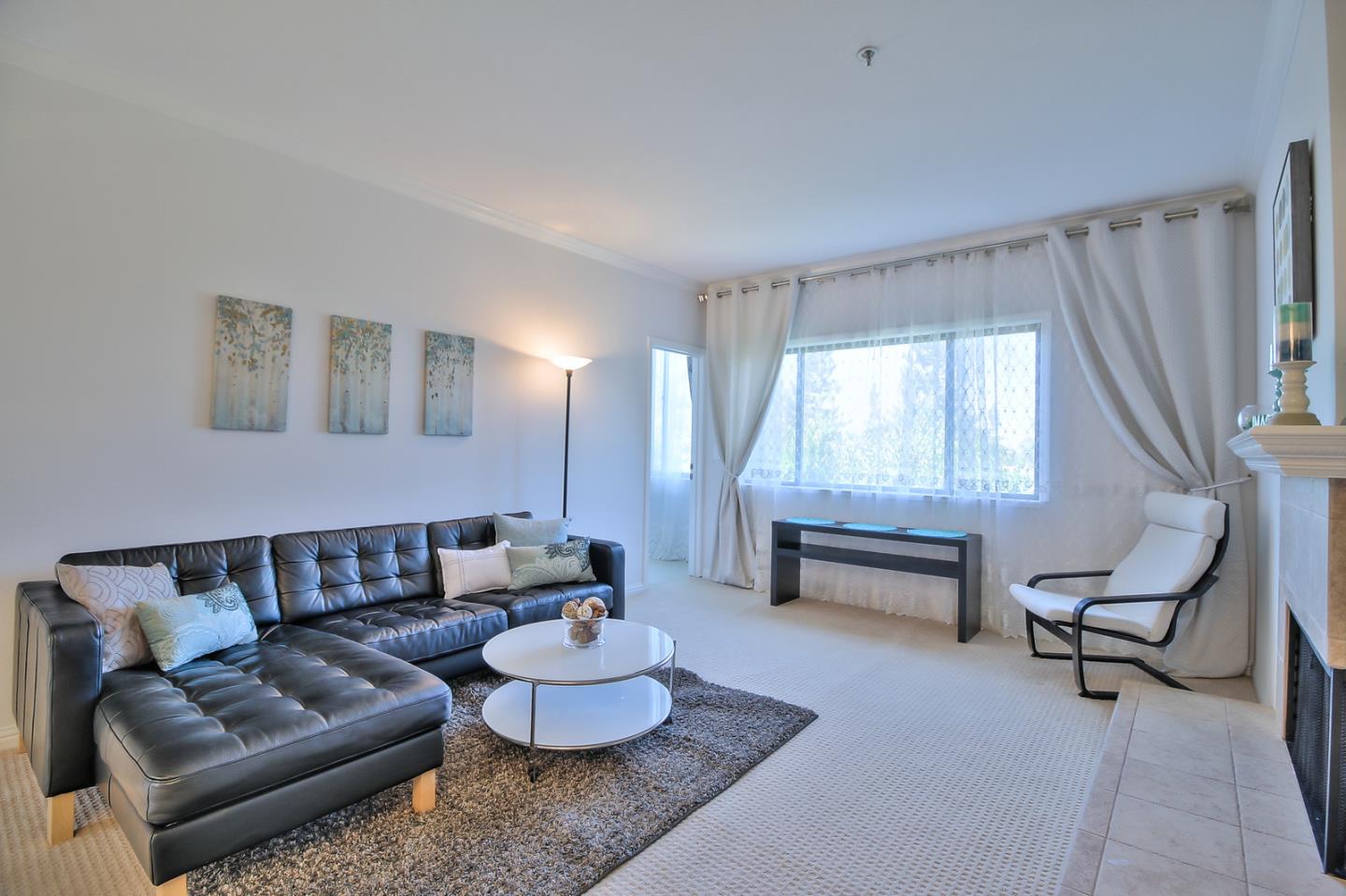 2200 Agnew Road, Unit 210 Santa Clara, CA 95054 - Photo 4 of 30 a living room with furniture and a window