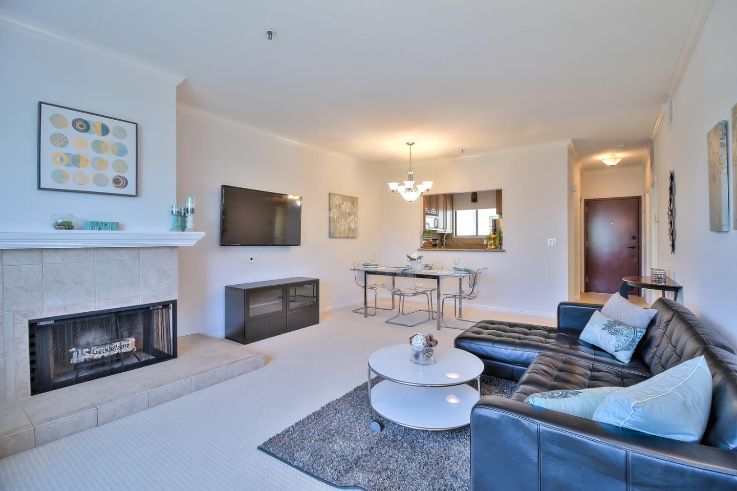 2200 Agnew Road, Unit 210 Santa Clara, CA 95054 - Photo 5 of 30 a living room with furniture and a fireplace