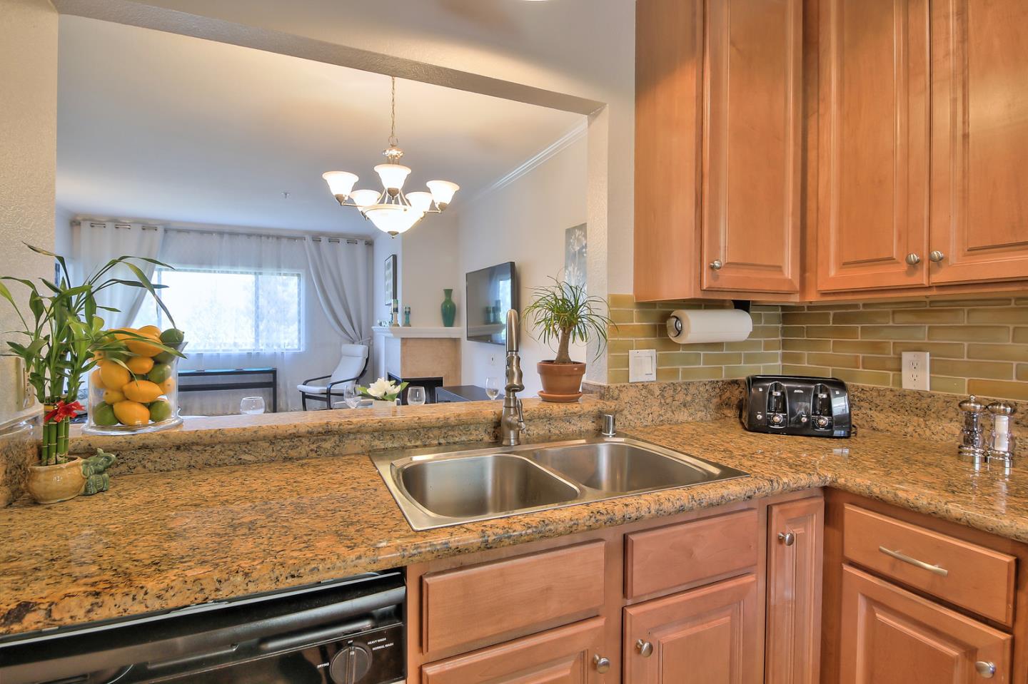 2200 Agnew Road, Unit 210 Santa Clara, CA 95054 - Photo 7 of 30 a kitchen with a sink cabinets and window