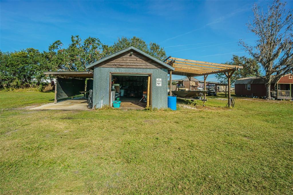 16 Ridge Road Frostproof, FL 33843 - Photo 20 of 29 Garage/Workshop