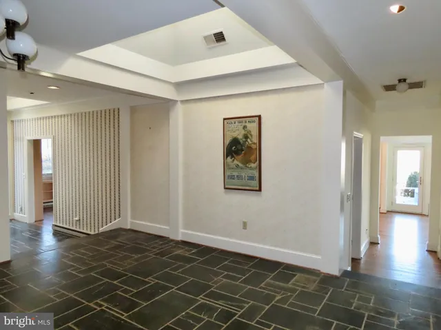 a bathroom with a bathtub and a toilet