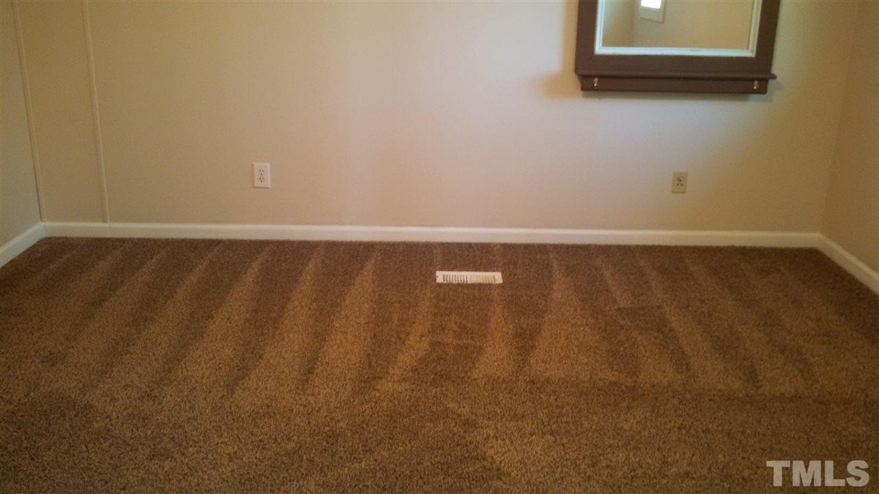 2001 Sanders Road Stem, NC 27581 - Photo 12 of 21 a view of wooden floor