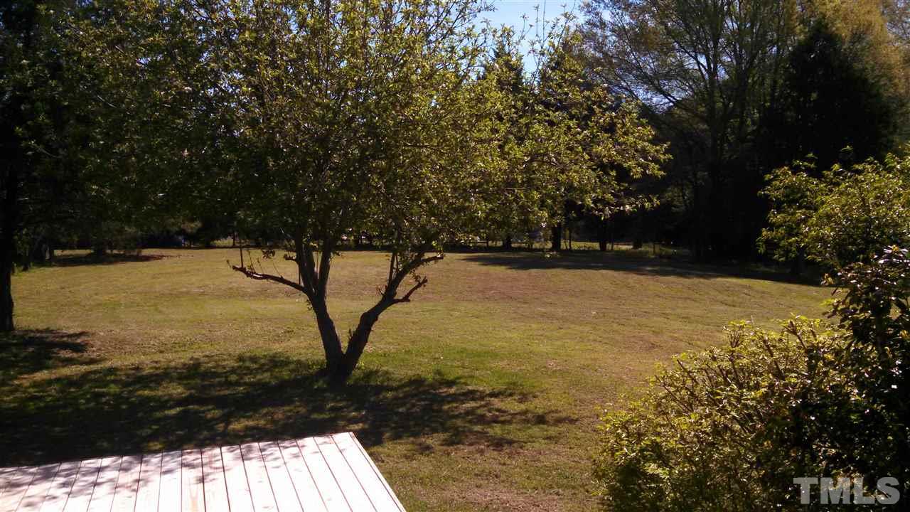 2001 Sanders Road Stem, NC 27581 - Photo 17 of 21 a view of outdoor space with trees