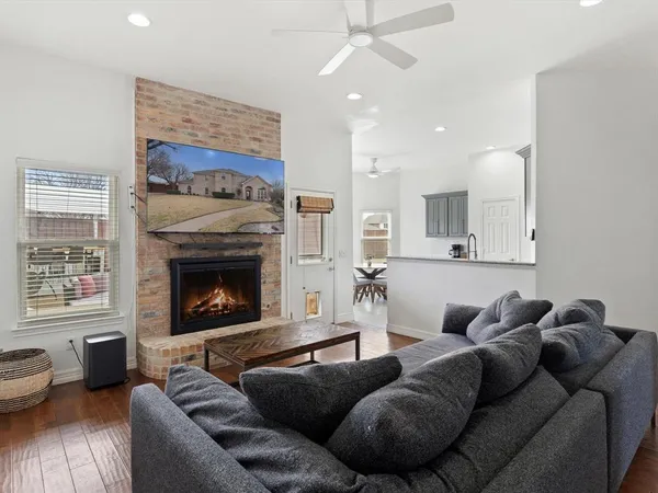 a view of a house with a yard porch and sitting area