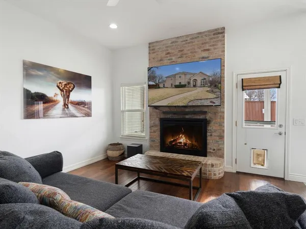 a view of a chairs and table in the balcony