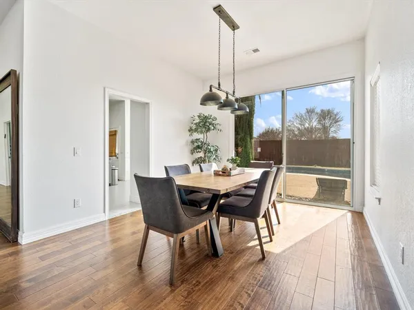 a living room with furniture a rug and a fireplace